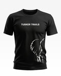 Black men's t-shirt with 'TUSKER TRAILS' text and white elephant graphic print
