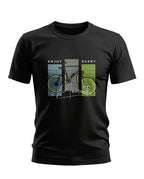 Black men's graphic t-shirt with yellow bicycle and 'Enjoy Every Moment' text print