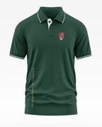 Green men's polo t-shirt with skull in beret patch and 'Conqueror of Enemies' text on side