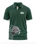Green men's polo t-shirt with white leopard graphic and 'Roar and the Rise' text design.