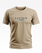 Beige men's t-shirt with 'CAPTAIN' text and blue wing anchor graphic on chest