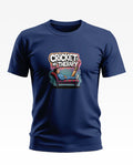Navy blue t-shirt with 'Cricket is my therapy' graphic and cartoon man on couch with cricket bat