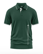 Dark green men's polo shirt with white collar trim and 'Pilot in Progress' airplane graphic